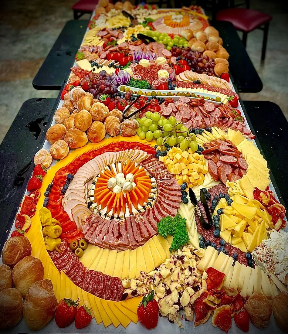 A grazing appetizer table laid out by Main Event Catering