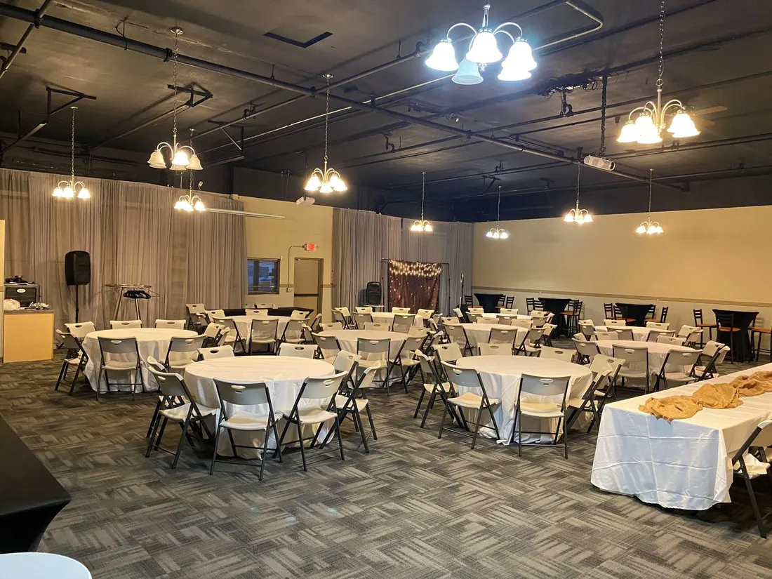 The Main Event Room, dressed in white linen